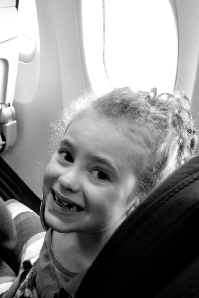 Happy on an airplane.