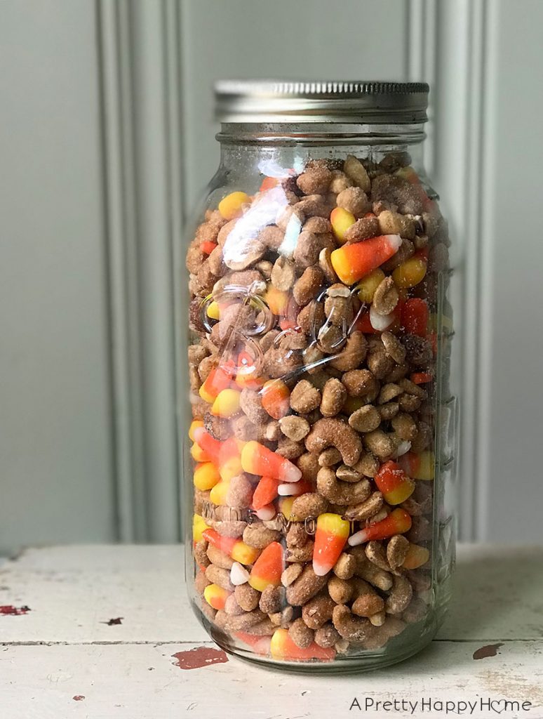 candy corn in a ball glass jar on the happy list