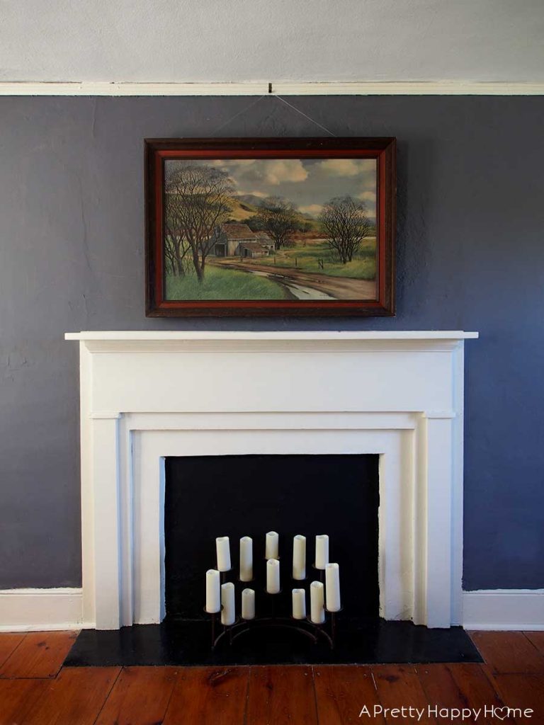 james peter cost painting over white fireplace