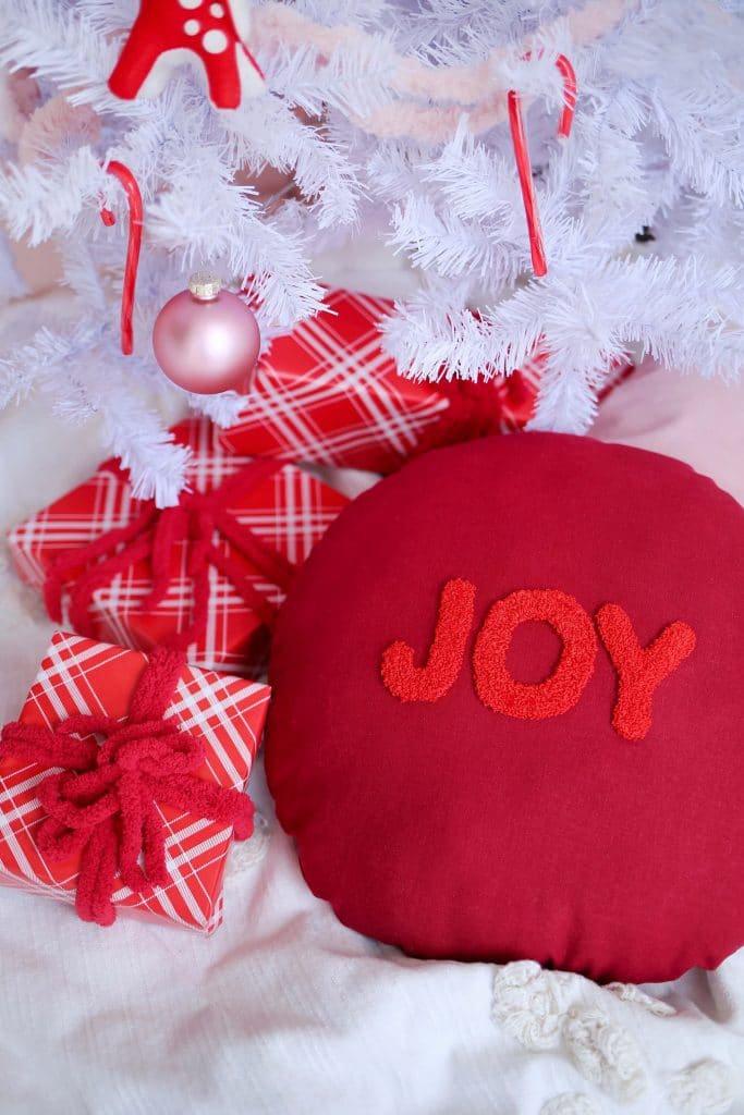 punch needle joy pillow by a beautiful mess on the happy list