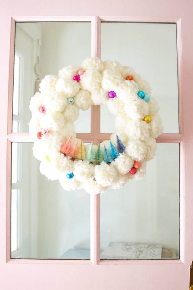 bottle brush pom pom wreath from modern glam home on the happy list