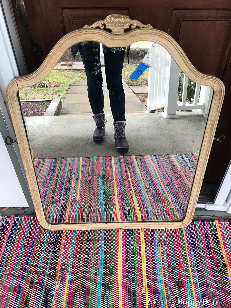 thrift store find arched wooden mirror
