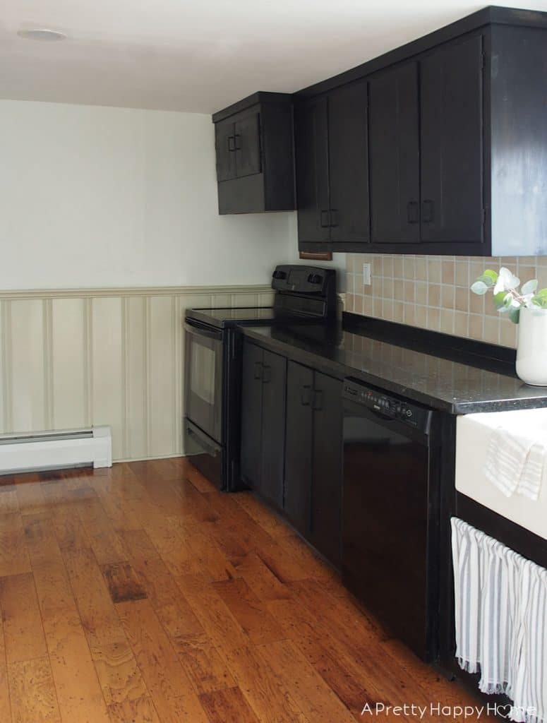 6 Month Progress on the Colonial Farmhouse kitchen black stained cabinets