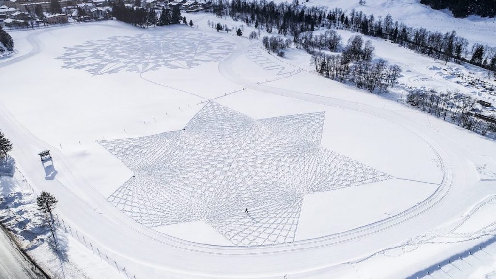 simon beck walking snow art on the happy list