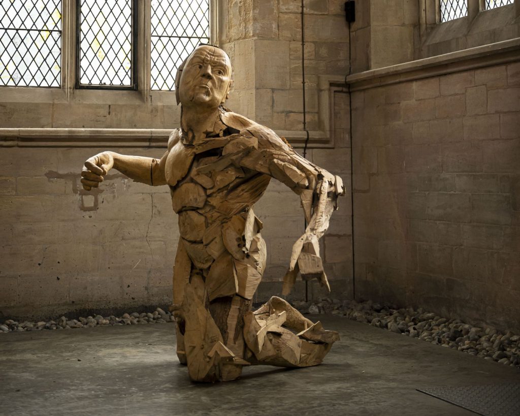 British sculptor Jamie Frost wood sculpture via creative boom on the happy list