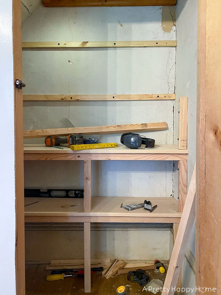 under the stairs shelves in progress