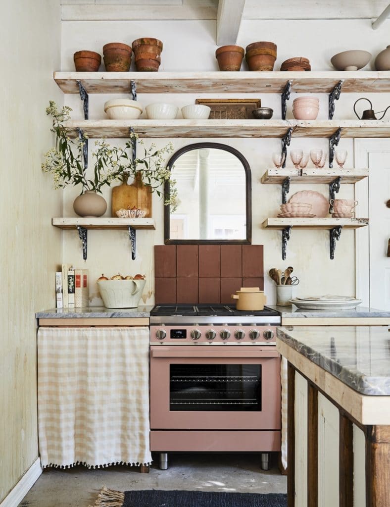PHOTOGRAPHY BY NICOLE FRANZEN; STYLING BY KATE BERRY leanne ford pink kitchen via domino on the happy list