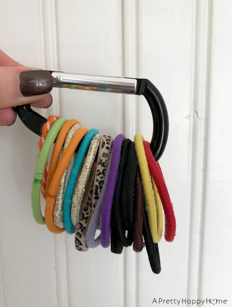 organization tricks store hair bands on a carabiner