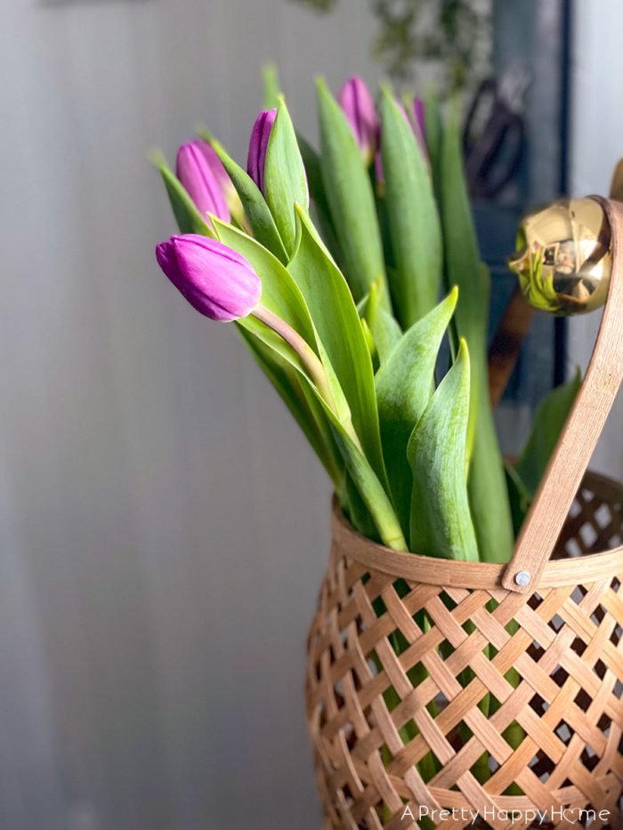 purple tulips in basket on the happy list