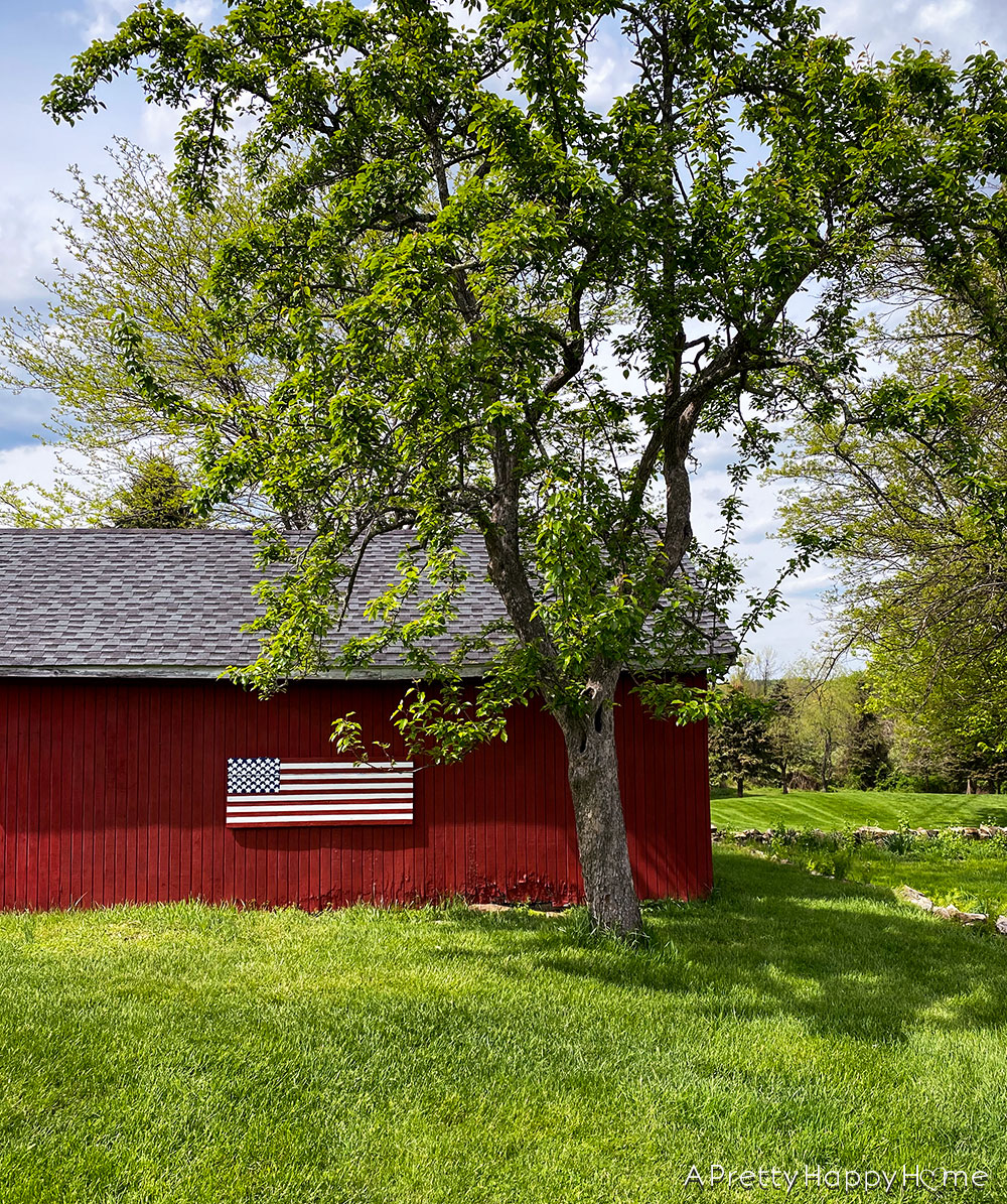 american flag on side of barn