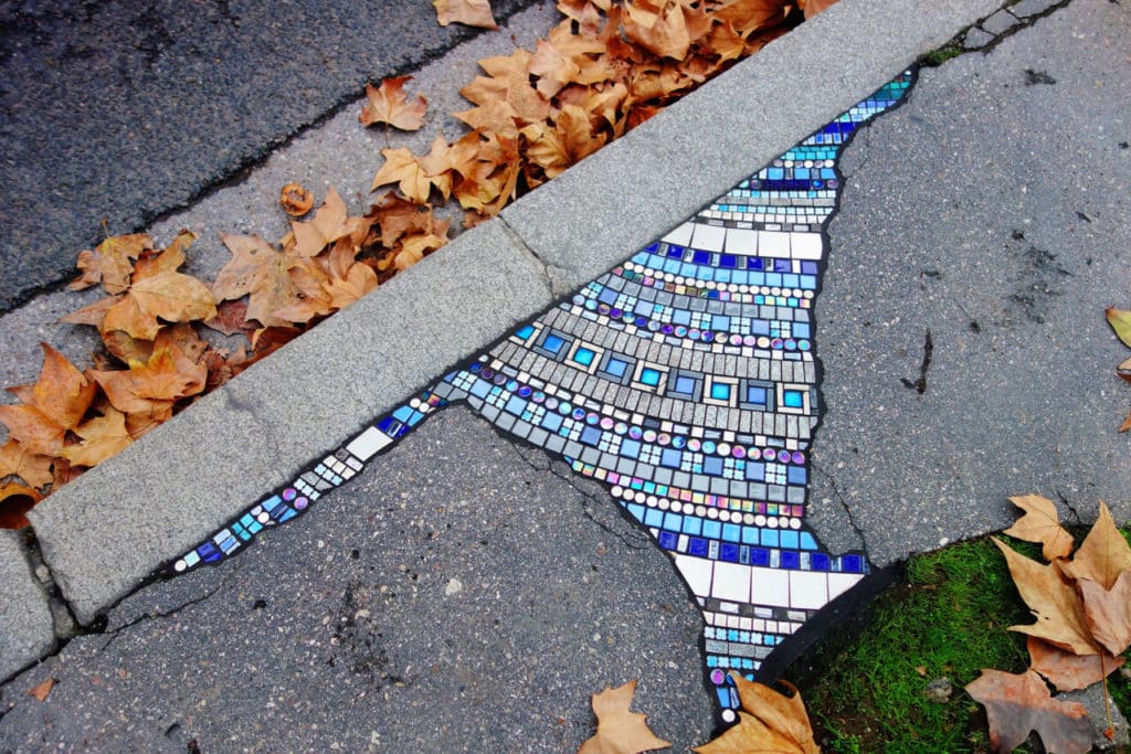 cracked sidewalk mosaic repair copyright ememem via this is colossal on the happy list