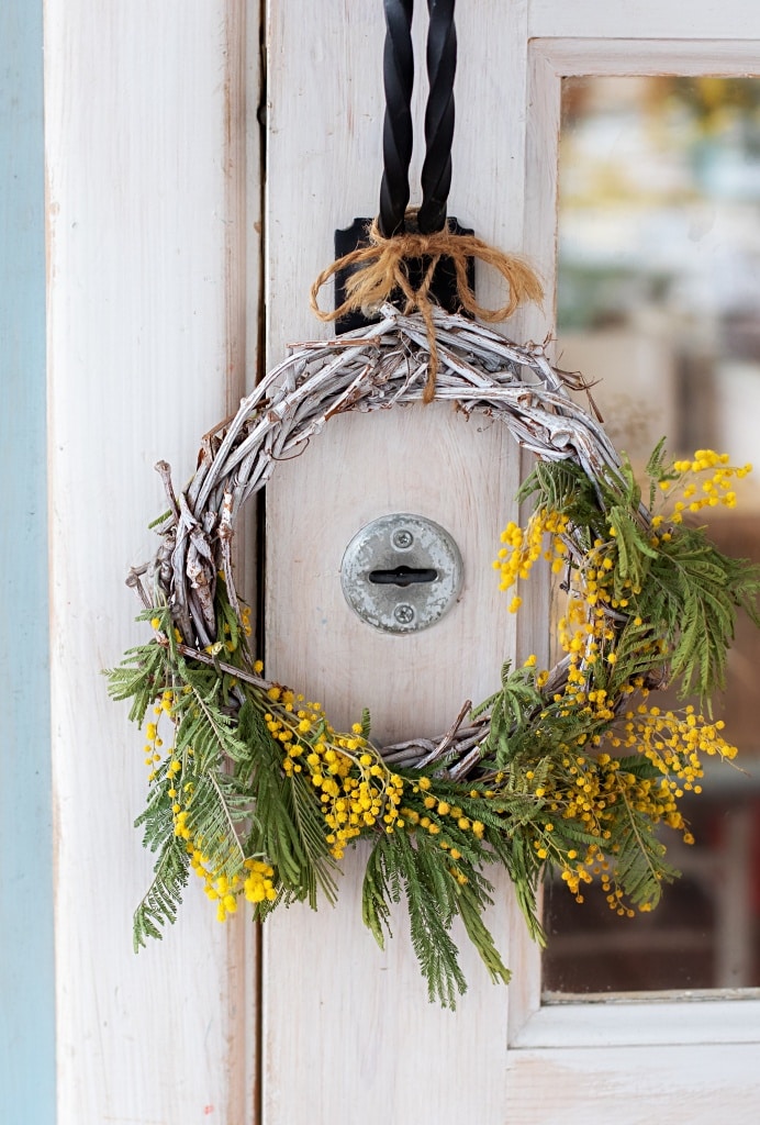 yellow berry summer wreath via town and country living on the happy list
