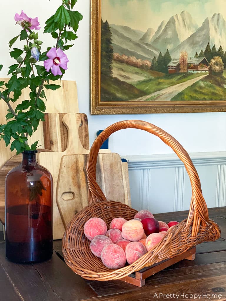 farmhouse garden basket of peaches on the happy list