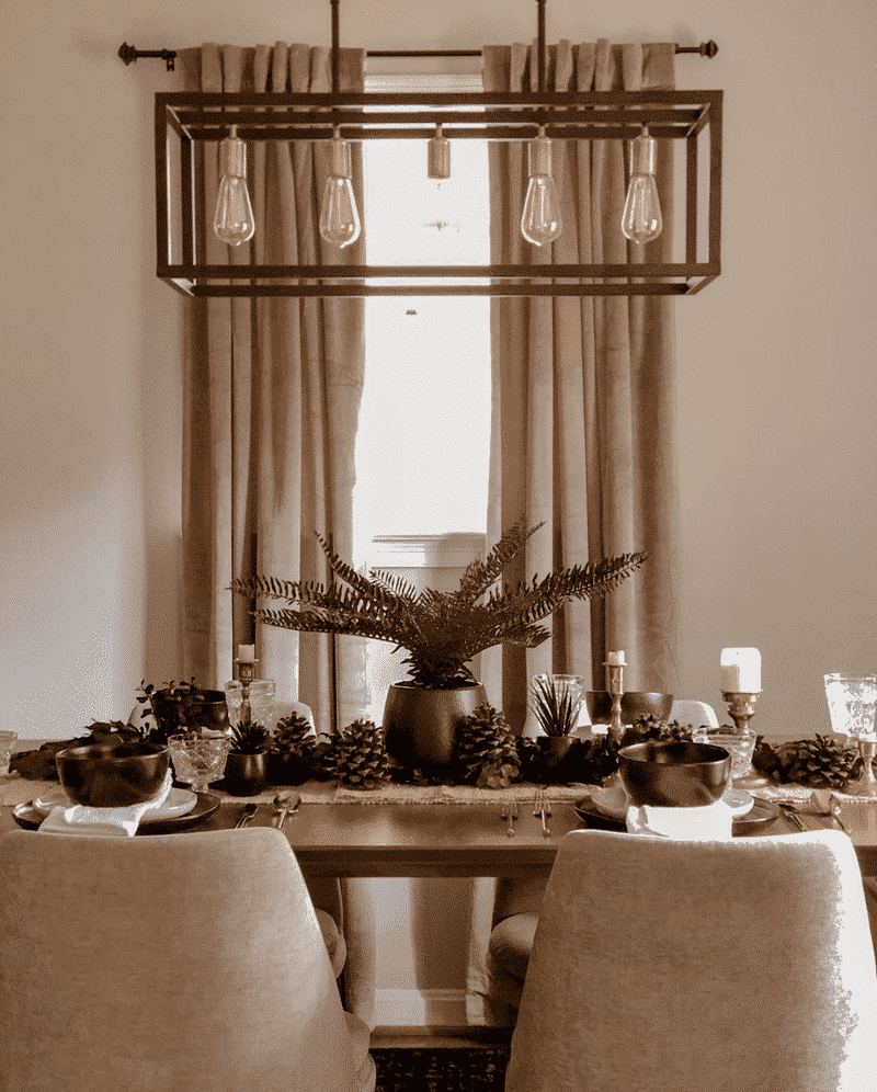 True Home table with pinecones via my domaine on the happy list