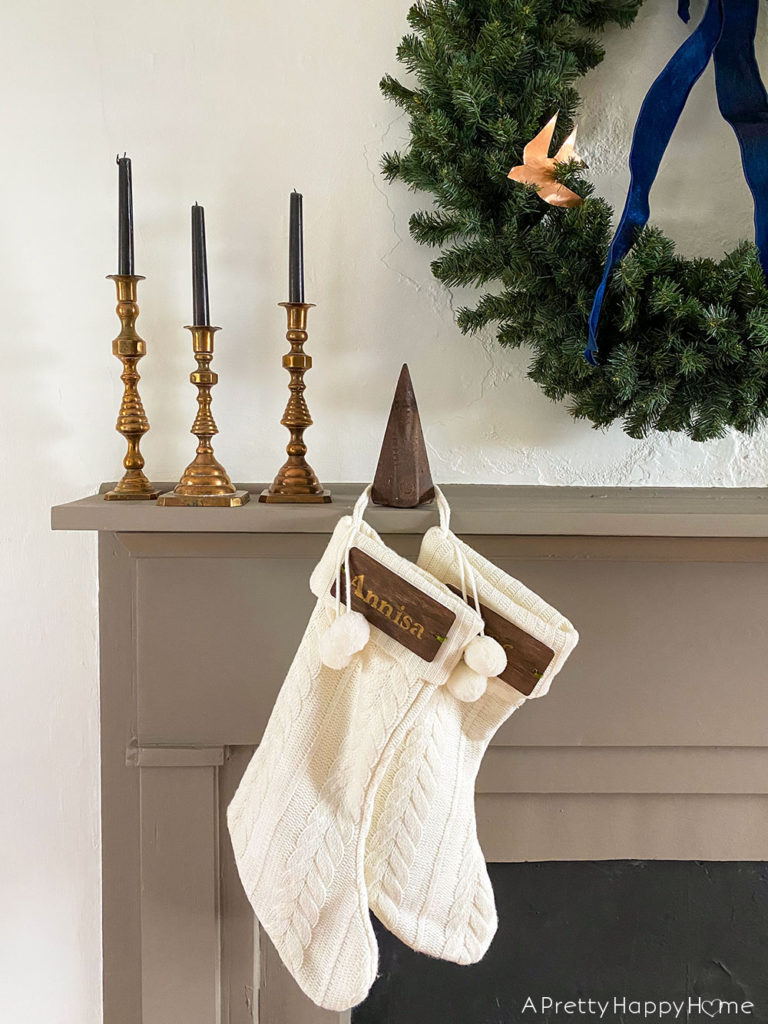 christmas mantel with copper accents splitting wedge stocking holder