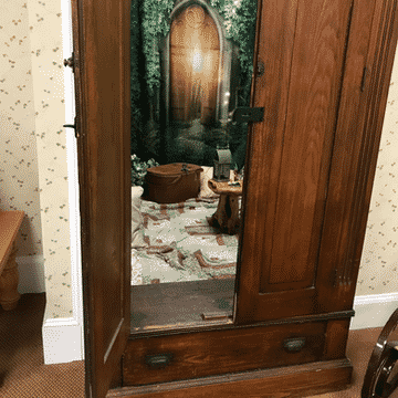 the storyteller's cottage secret portal hidden wardrobe door on the happy list