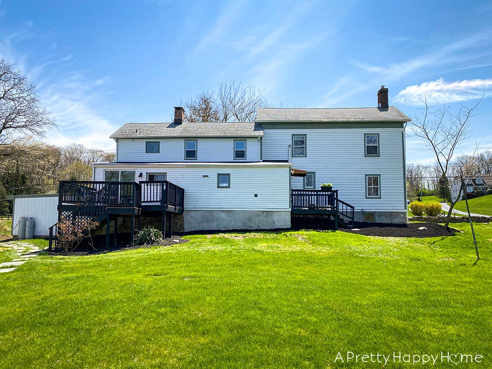 white colonial farmhouse in 2022