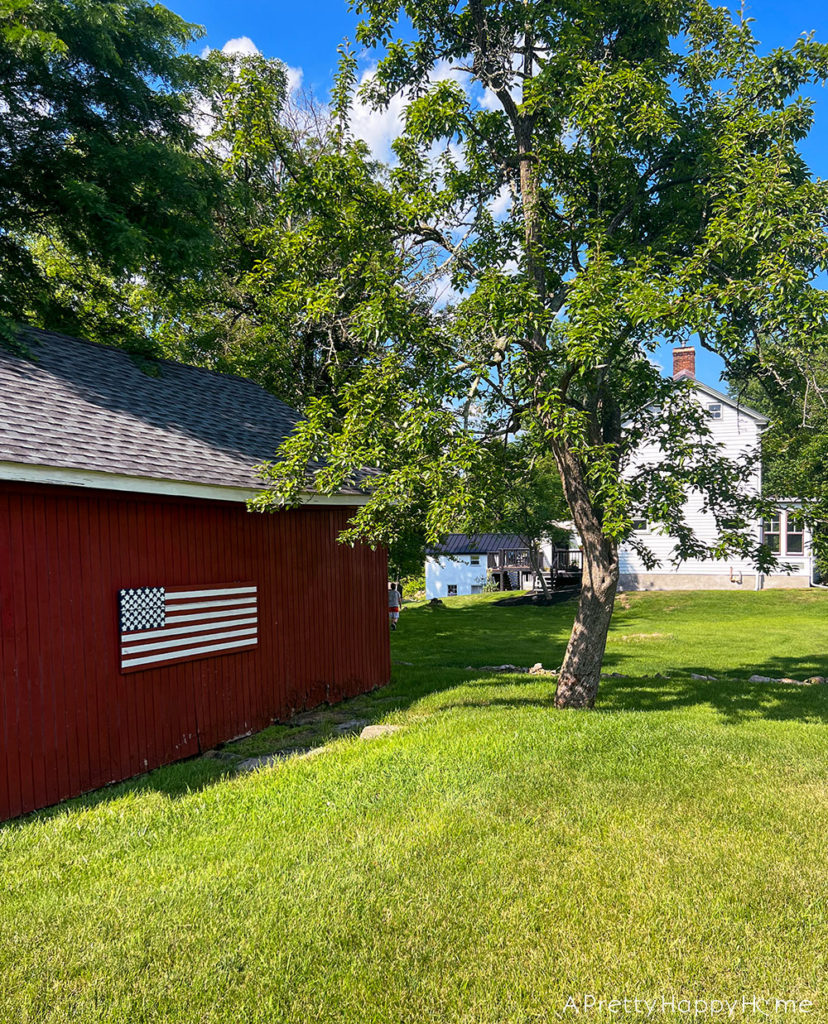 red barn with american flag 4th of july