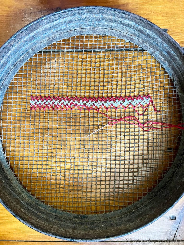 cross stitch american flag on a grain sifter 4th of july wreath