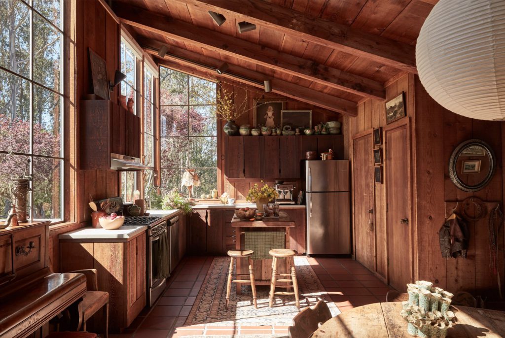 emily ward kitchen via domino on the happy list Designer Emily Ward in her Marin County home. The rug and bench, atop floor tiles original to the property, are from Pierce & Ward. G Photography by SETH SMOOT Styling by KENDRA SMOOT