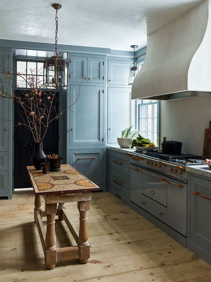 kitchen with floor to ceiling light blue cabinets and window transom on the happy list via desire to inspire