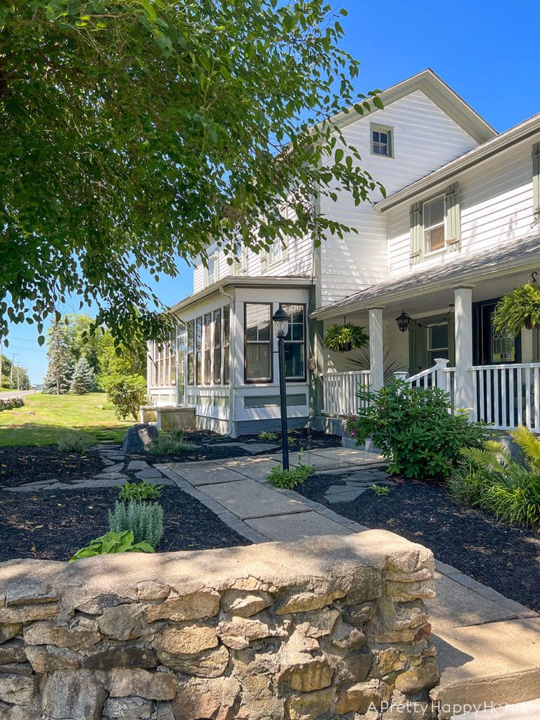 colonial farmhouse landscaping with stone wall how our landscaping survived a dry summer