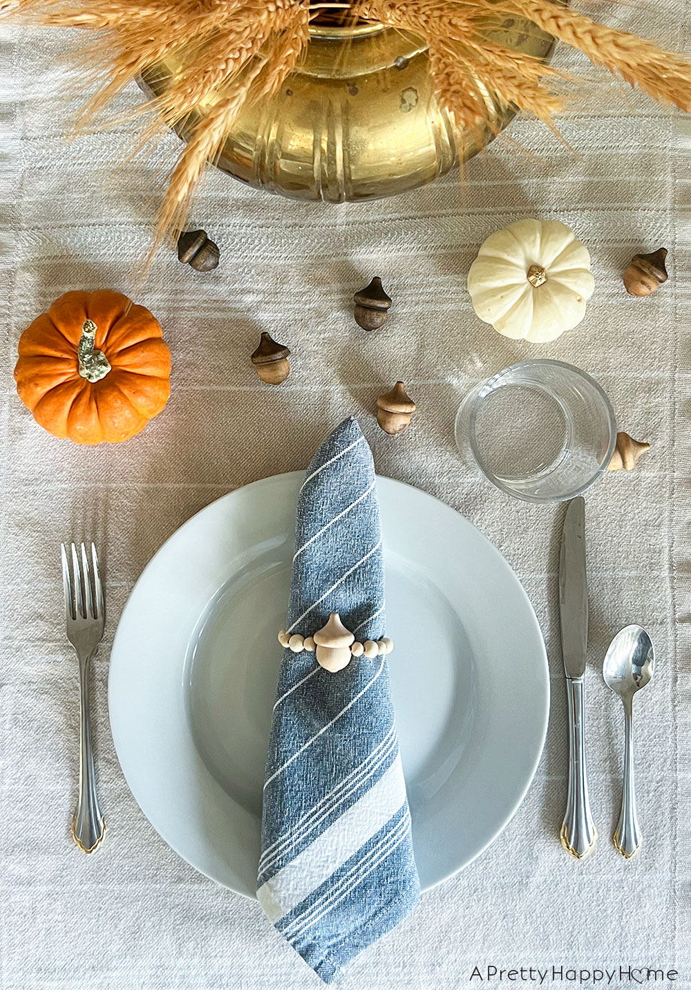 DIY Wood Acorn Napkin Rings how to make wood bead and acorn napkin rings fall napkin rings thanksgiving napkin rings