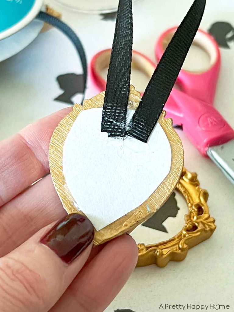 diy mini silhouette christmas ornaments with gold frames