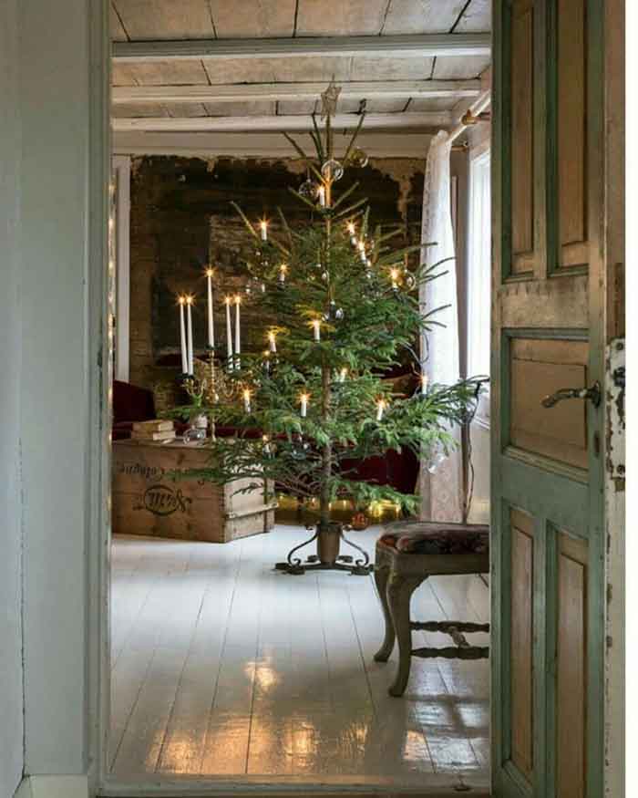 scandinavian christmas tree with beautiful tree stand via My Scandinavian Home on the happy list