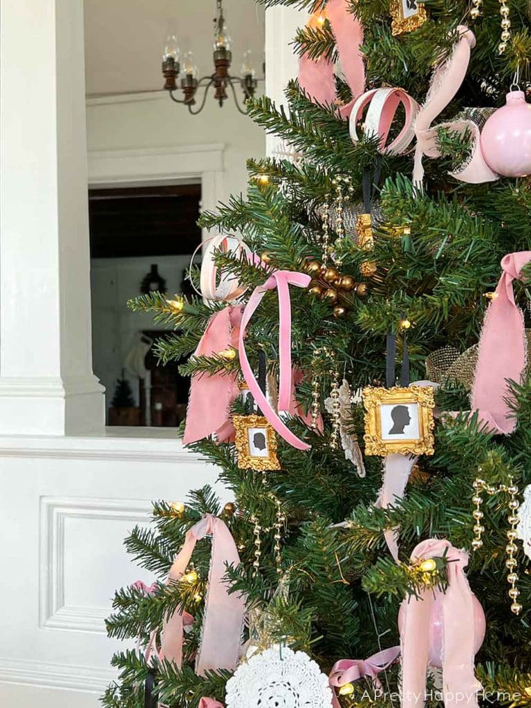 pink christmas tree decorations with silhouette ornaments in a colonial farmhouse
