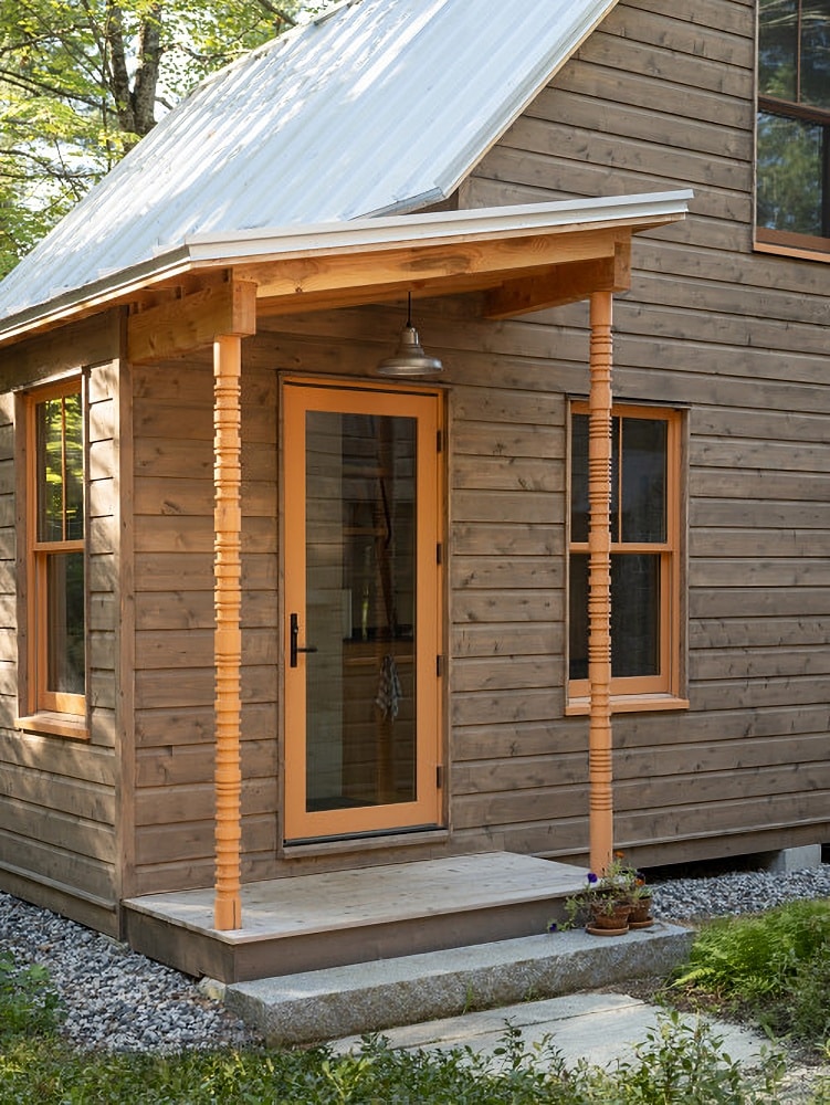 turned front porch posts on cabin in maine by Woodhull on the happy list