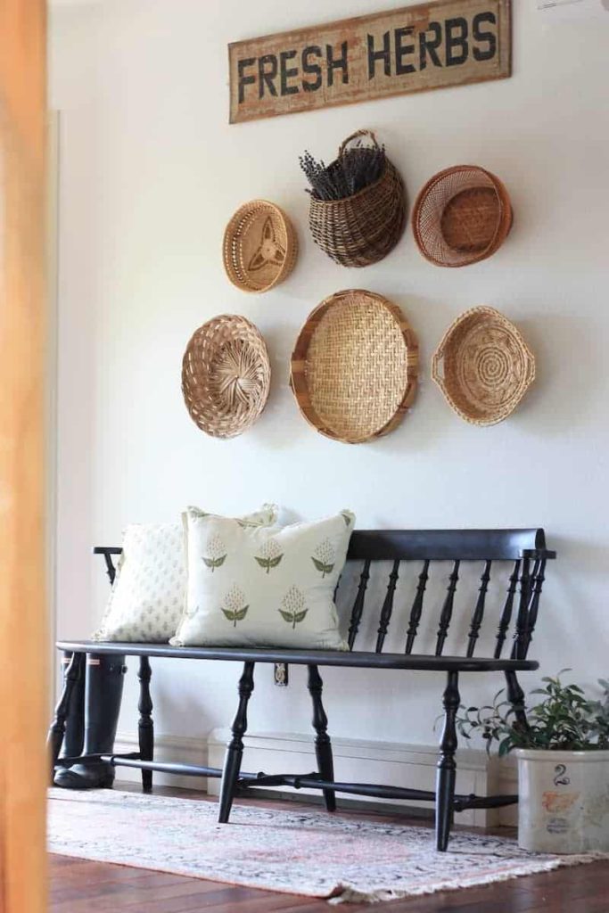 basket wall over black bench by Boxwood and Spruce in praise of basket walls