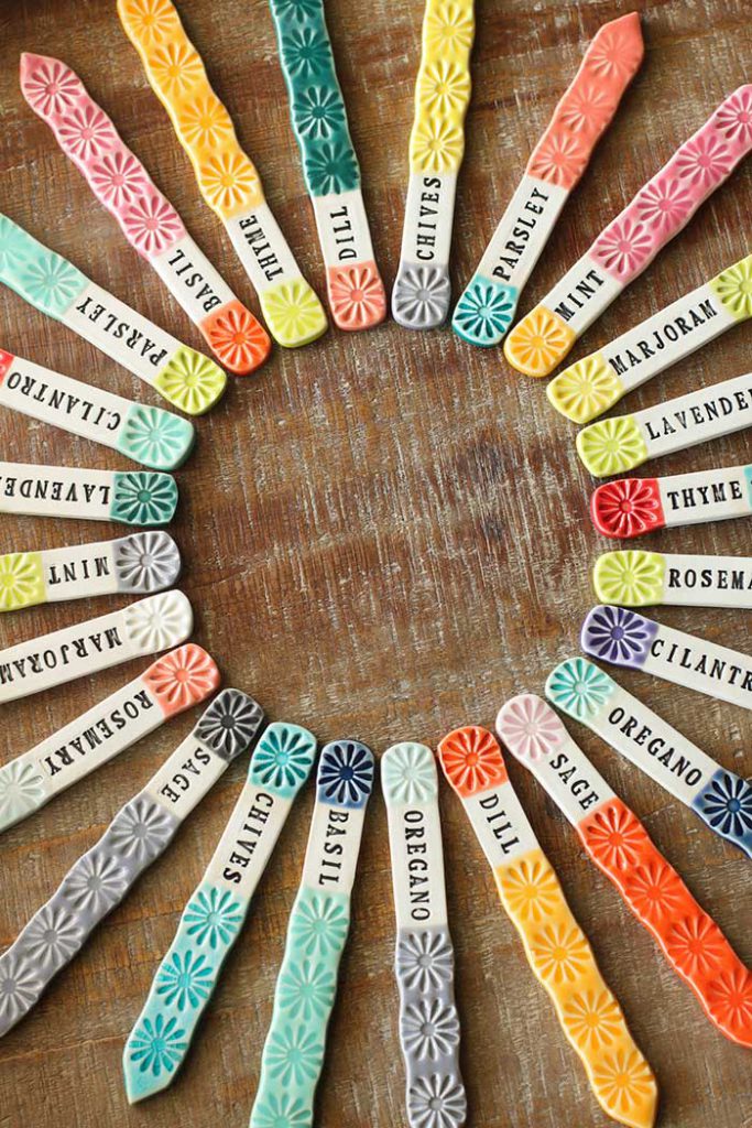 colorful ceramic herb markers as seen in HGTV magazine via etsy seller Clay Hive Co fun gardening finds 