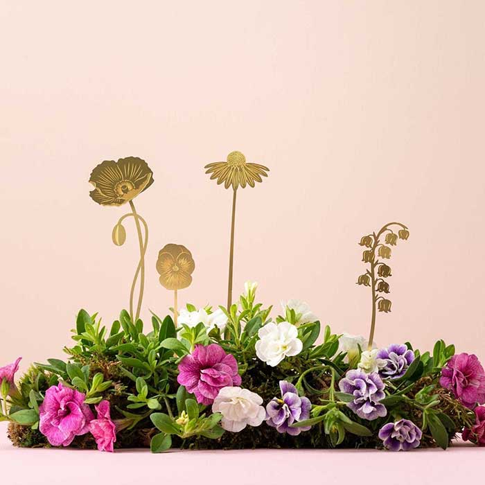 brass blooms plant stakes via etsy seller another studio fun gardening finds