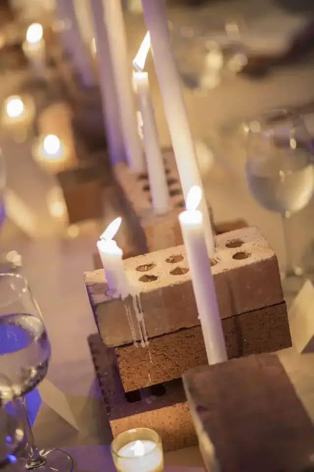 brick candleholders Photography by Ara Howrani, courtesy of David Stark Design and Culture Lab Detroit via The Organized Home on the happy list