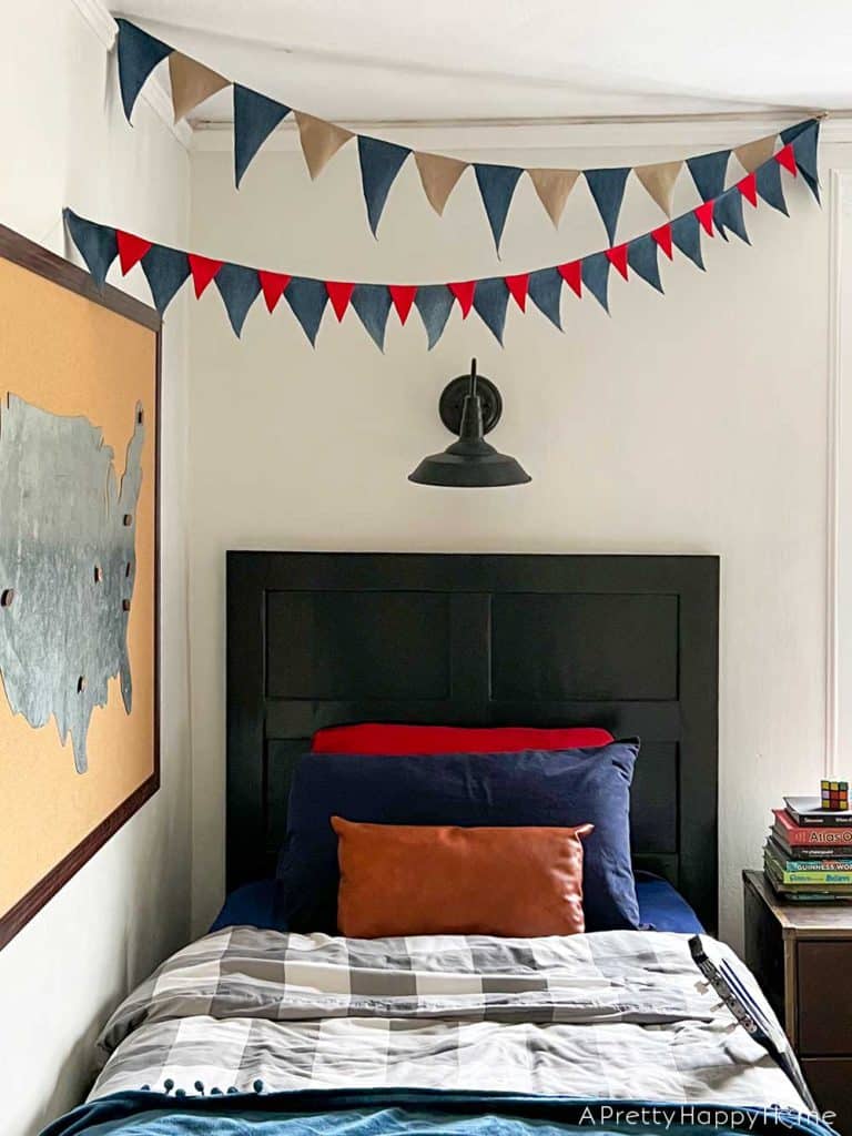 no sew denim bunting banner flag banner made from old jeans in a farmhouse bedroom