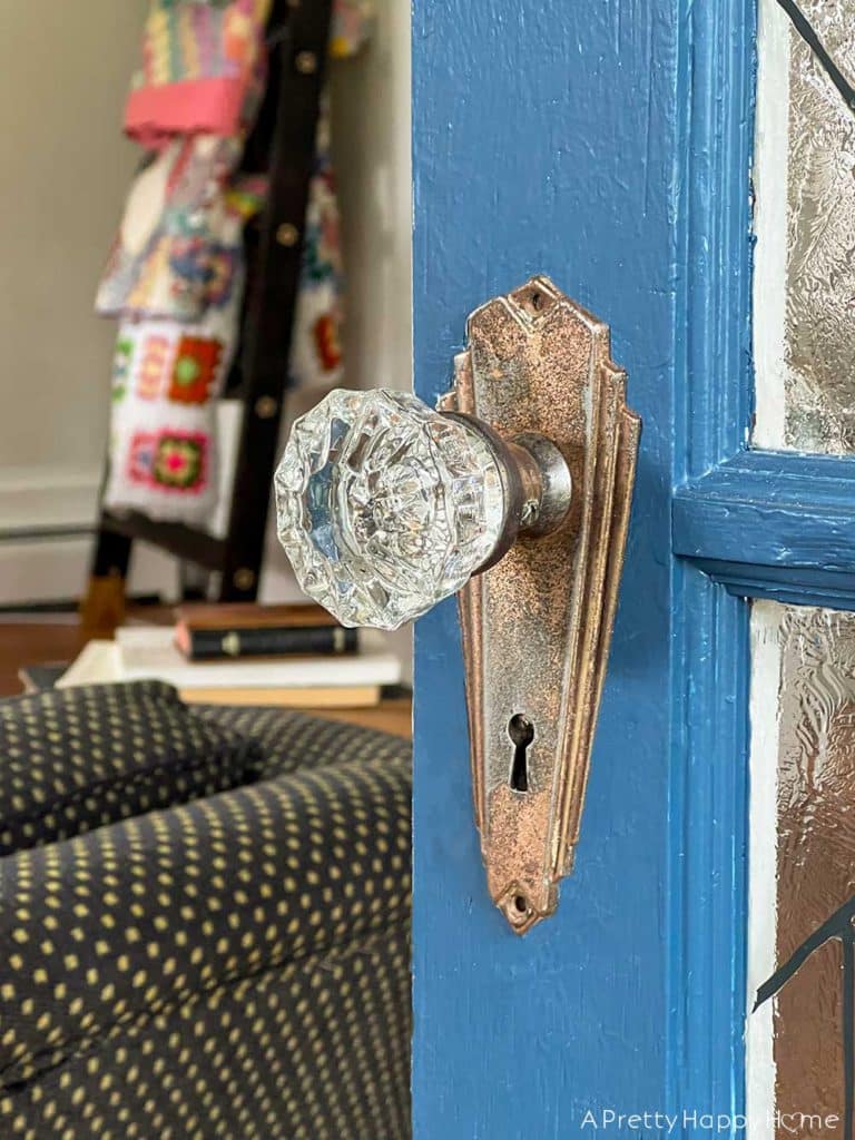 sunroom door hardware after removing paint from door hardware with a slow cooker