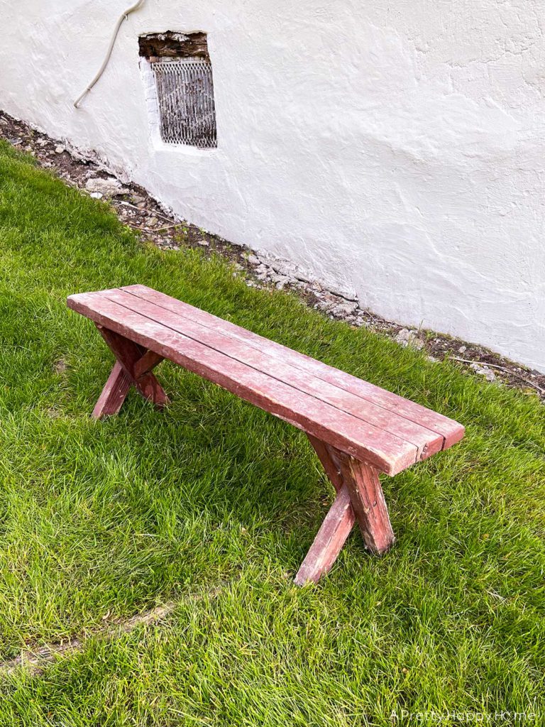Before photo of a Petite Bench For An Outdoor Coffee Table use a bench from a kid sized picnic table as an outdoor coffee table 