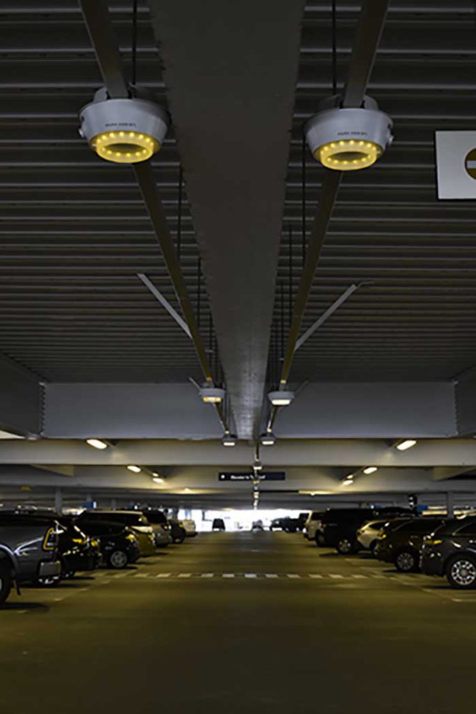 how airport parking lights at pdx looks to someone who is colorblind by any baio via the verge on the happy list