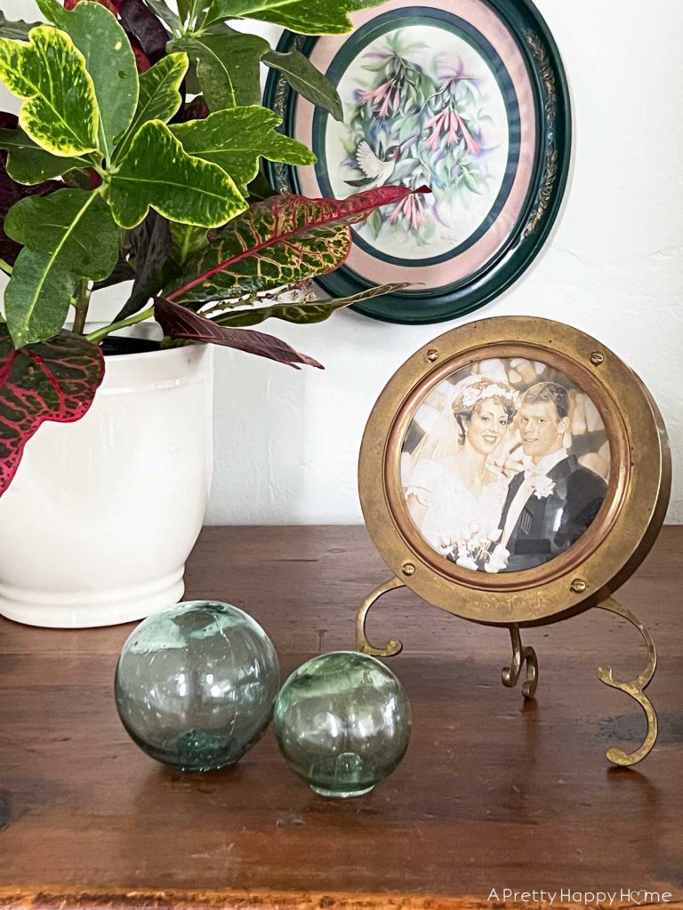 my latest thrift store finds brass clock turned picture frame decorating a home on a budget with thrifted finds