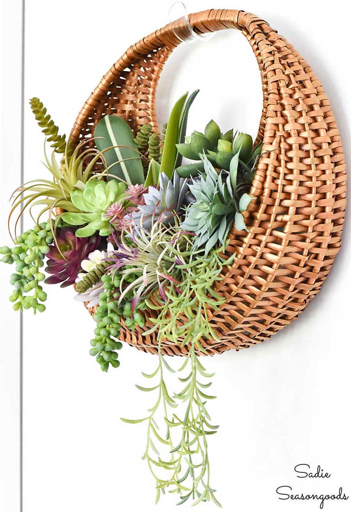 succulent wreath in a curved basket by sadie seasongoods on the happy list