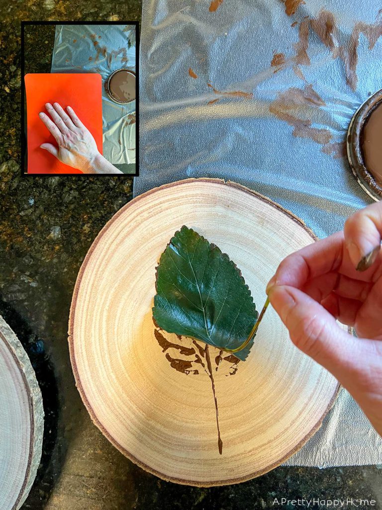 how to leaf stamp on wood using house paint or craft paint fresh leaves and wood rounds