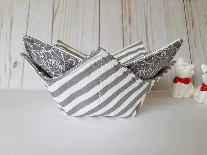 grey and white striped bowl cozies from Crafty Wanda via Etsy in praise of bowl cozies