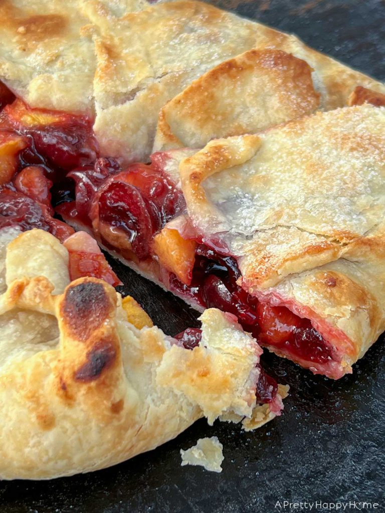 The Best Part Of Summer is being outside and eating a peach and cherry galette using the betty crocker pie crust recipe with butter instead of shortening