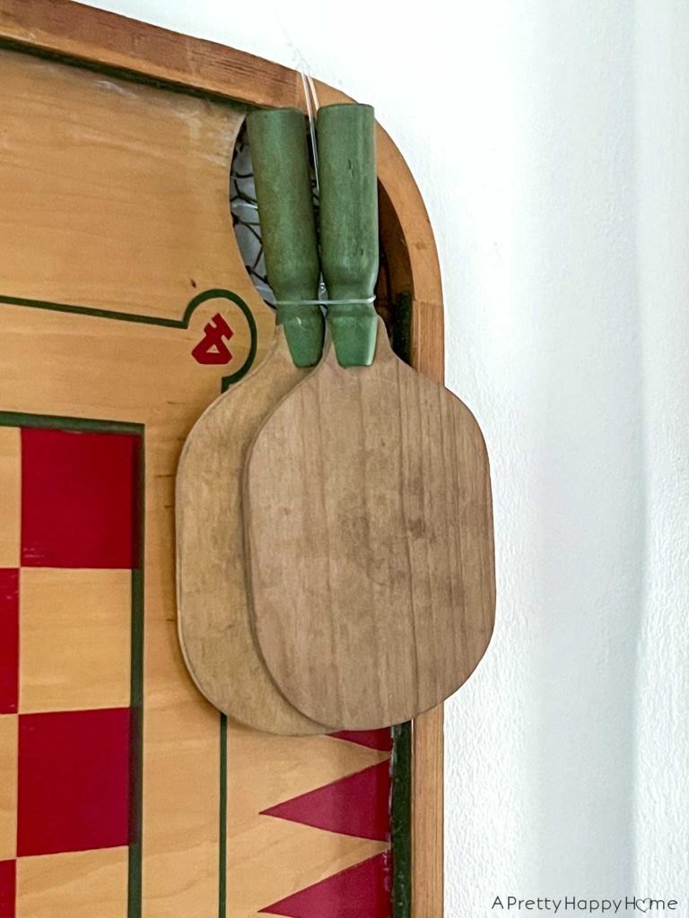 my latest thrift store finds vintage ping pong paddles decorating a home on a budget with thrifted finds