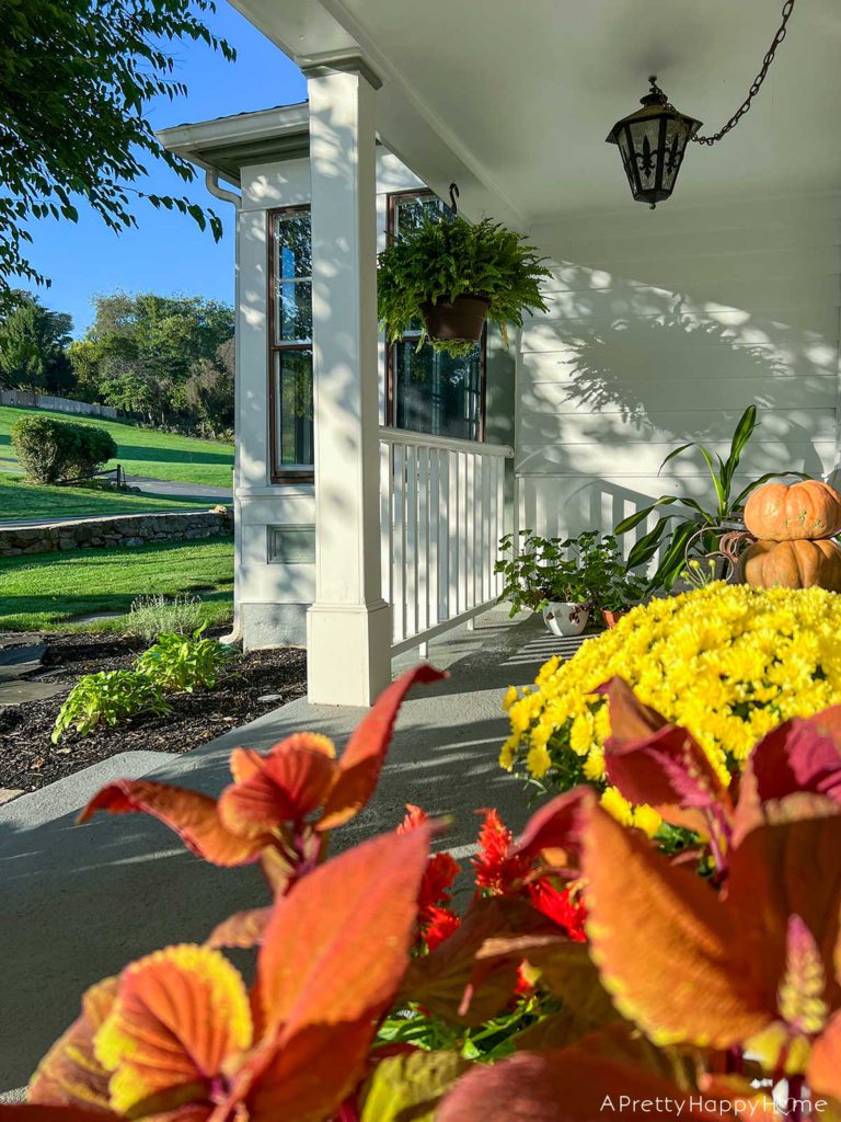 fall front porch view from a colonial farmhouse on the happy list