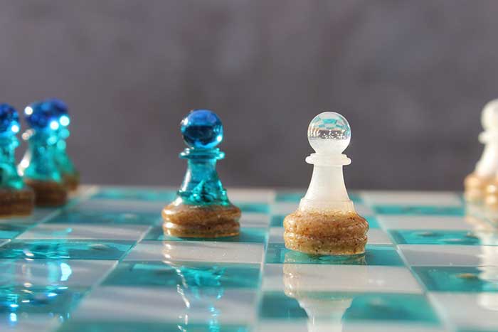 ocean chess set using sand in resin for the chess pieces hiera resin art via etsy in praise of unique chess sets