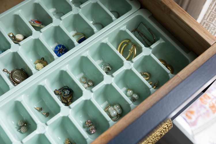 organize earrings with an ice cube tray by tessa cooper for The Spruce on the happy list