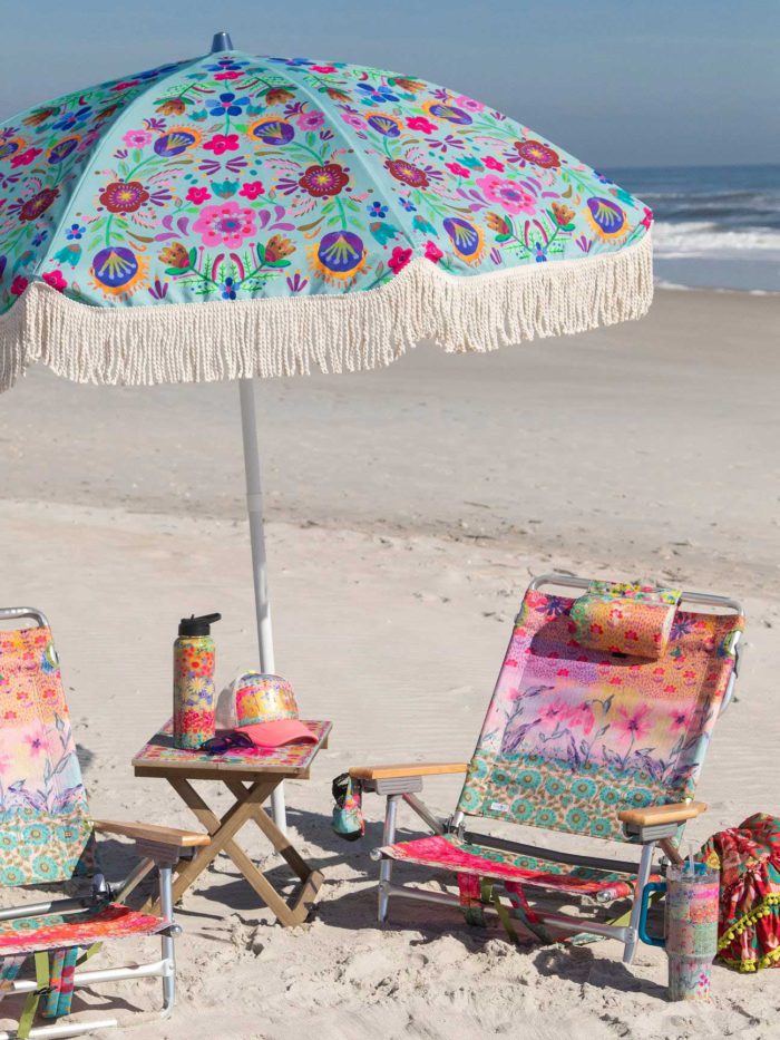 dusty blue folk flower patio umbrella from natural life in praise of colorful patio umbrellas