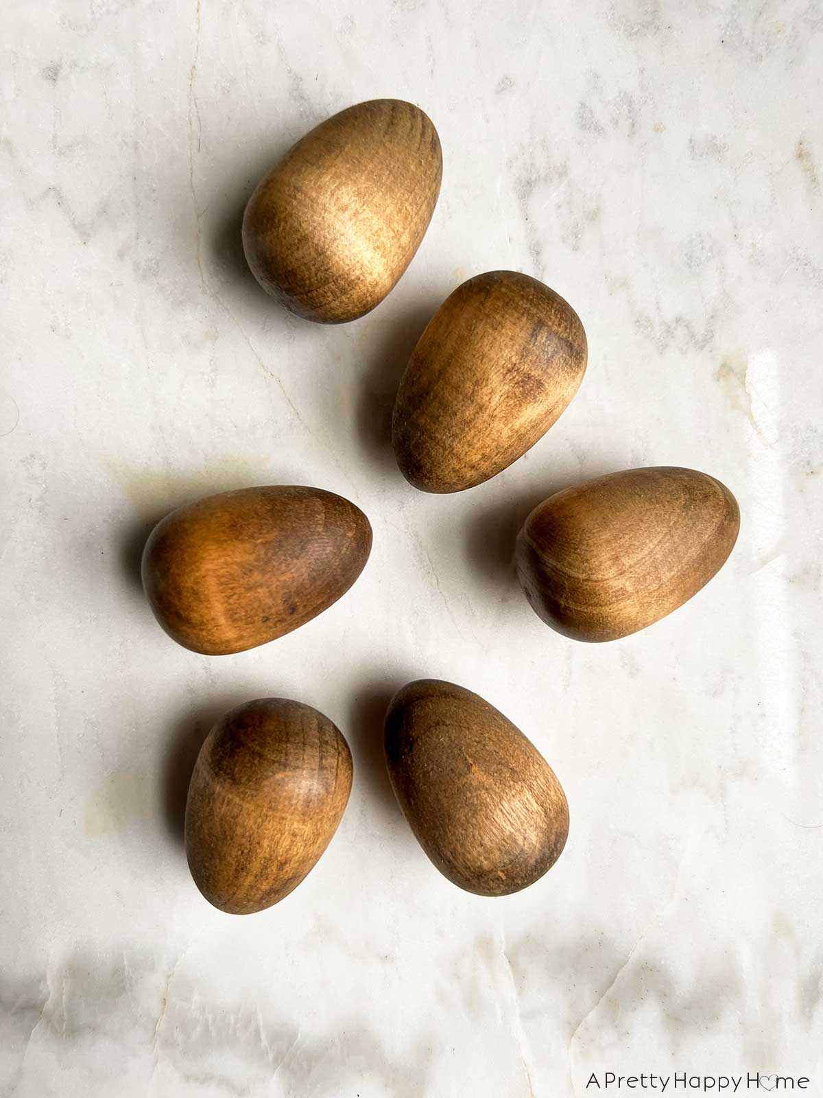 7 Ways To Decorate Wood Easter Eggs decorate wood eggs with stain and keep them natural looking